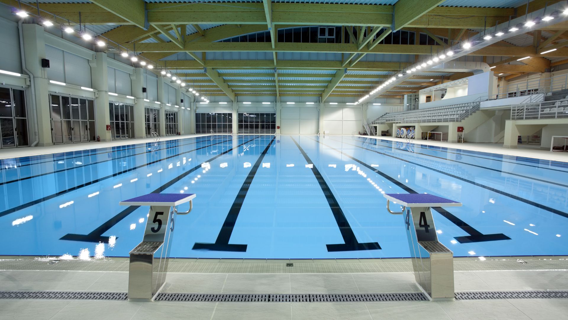 Coach leading a school swimming session